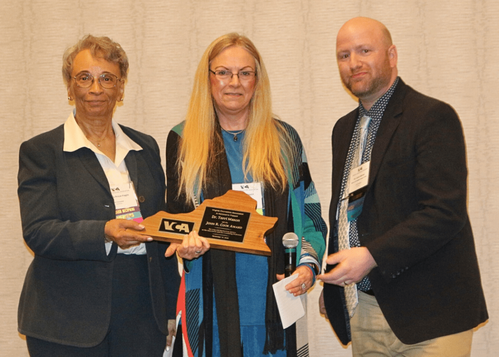 Left to right are Ellissia Price-Fagin, nominator; Terri Mason, recipient; and Corey Gerwe, VCA President.